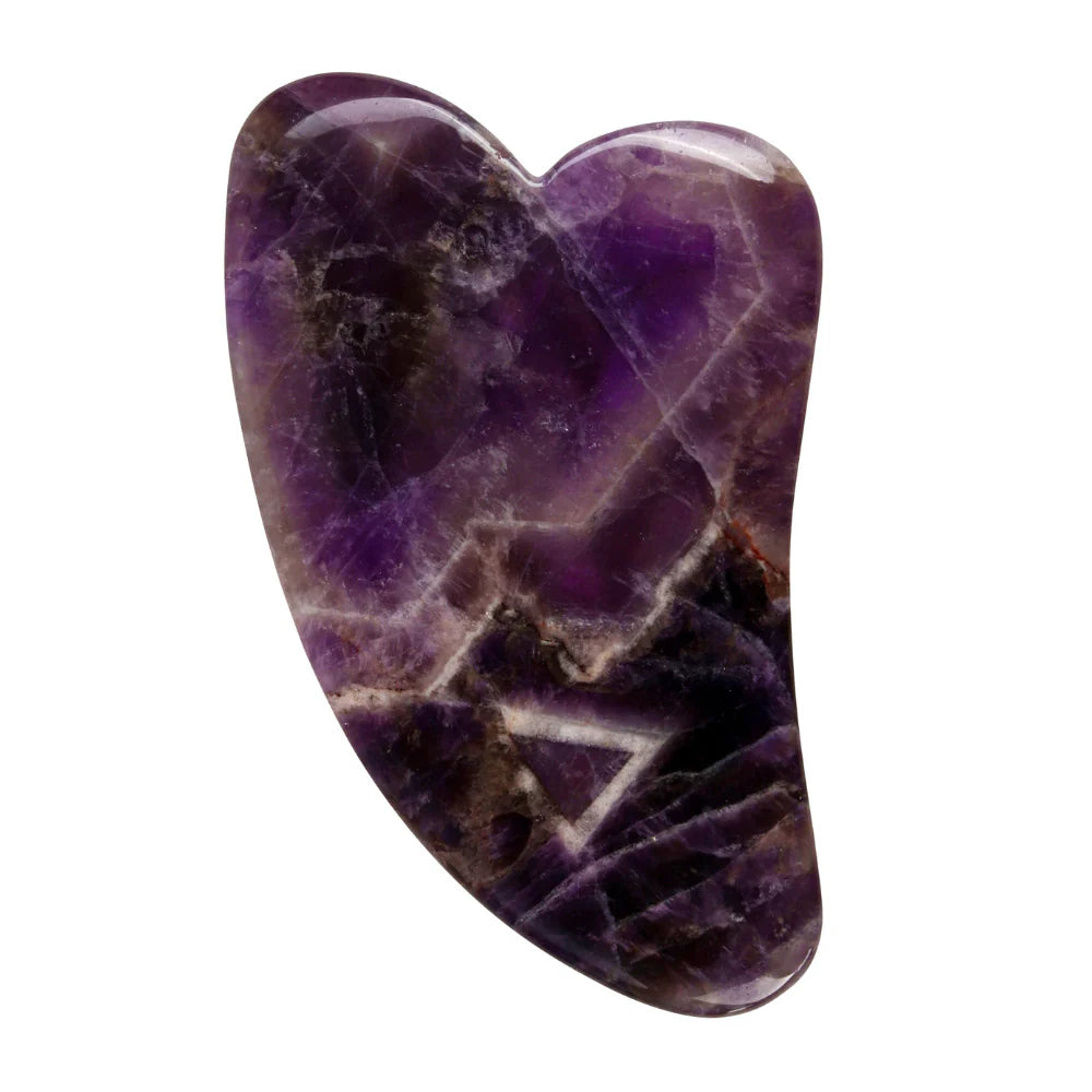 Amethyst crystal heart on a white background