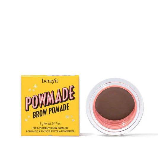 Benefit Powmade Brow Pomade with yellow packaging and brown pomade on a white background