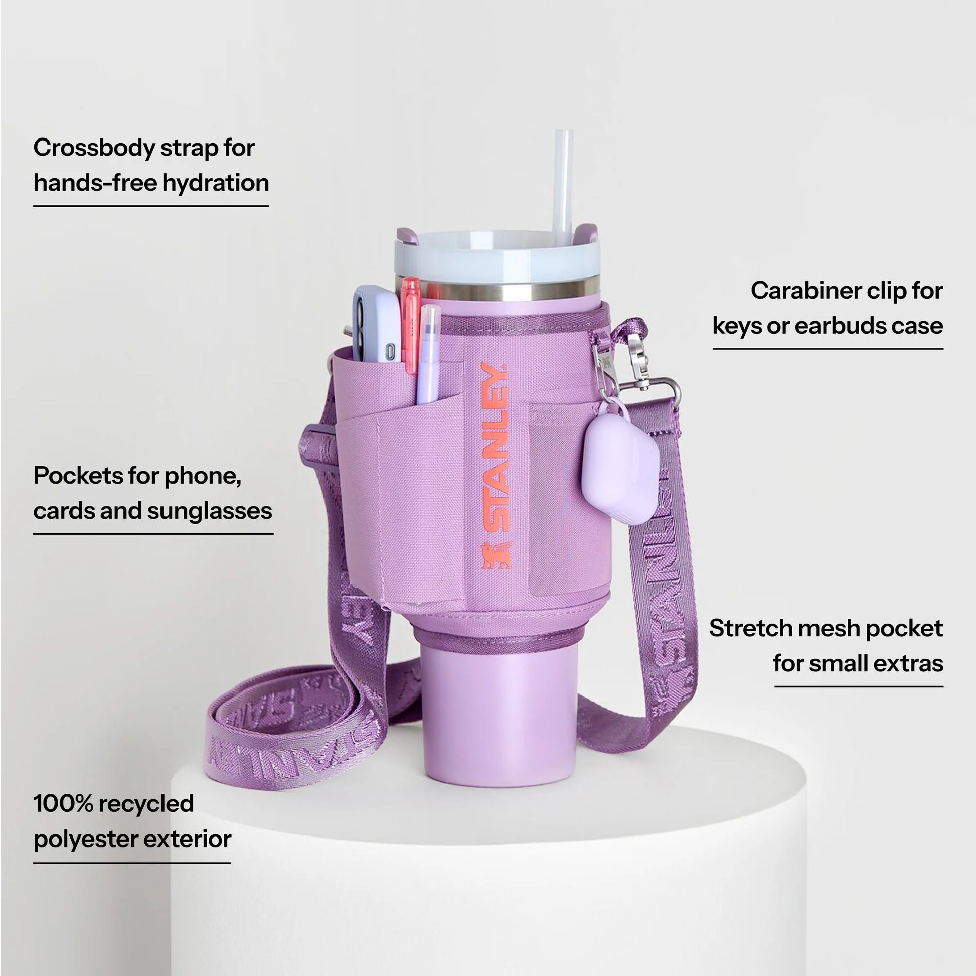 Pink water bottle holder with features highlighted on a white background