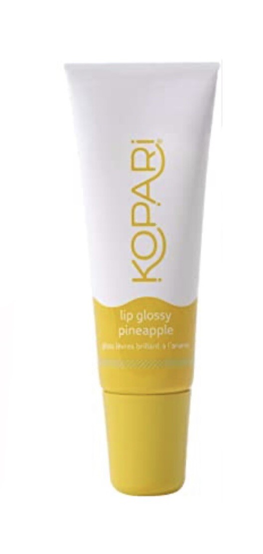 Kopari lip gloss in pineapple flavor on a white background